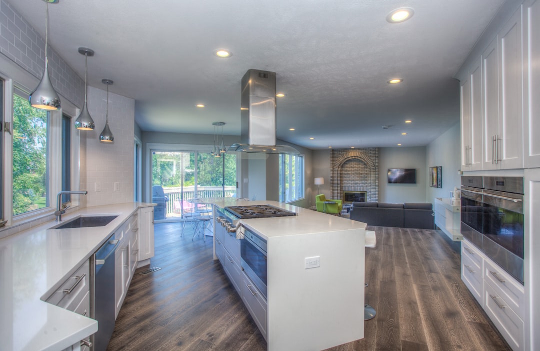 Comparison photo showing three finish levels in a Connecticut kitchen: builder-grade, mid-range, and high-end custom