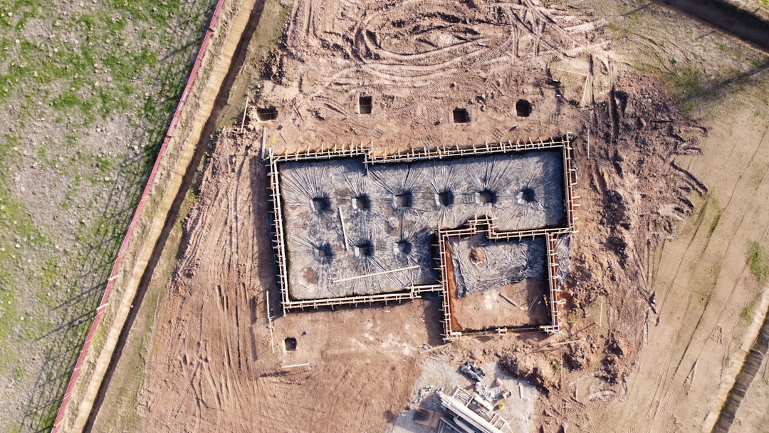 Side-by-side comparison photo showing slab, crawlspace, and basement foundation construction stages