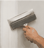 First bed coat of joint compound applied with drywall knife