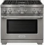 Dual-fuel professional range with gas cooktop and electric convection oven.