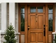 Stained wood entry door accent for a premium exterior finish.