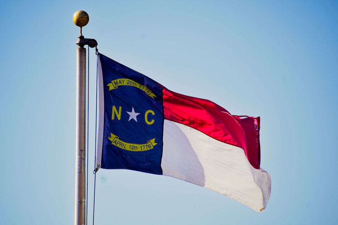 A map-style visual showing North Carolina regions with cost-per-square-foot ranges and key cost drivers