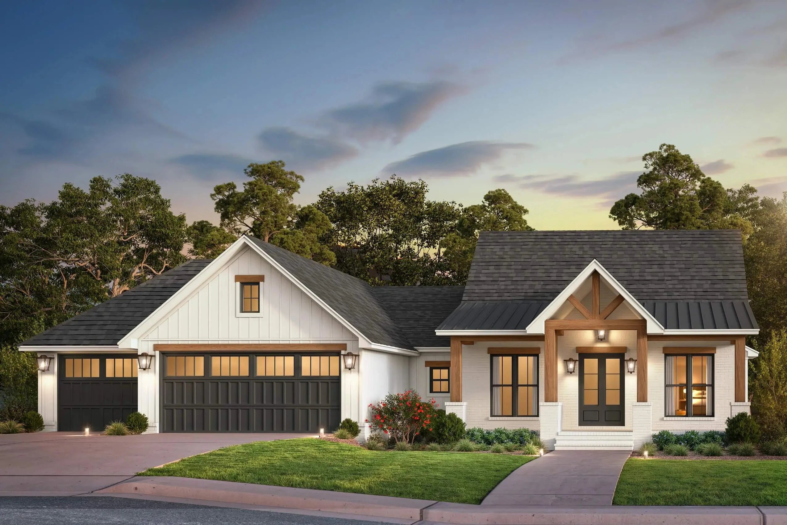 Exterior dusk rendering of the Hatley II farmhouse plan 1698-2, showing a one-story home with steep rooflines, a three-car garage, and a covered front porch